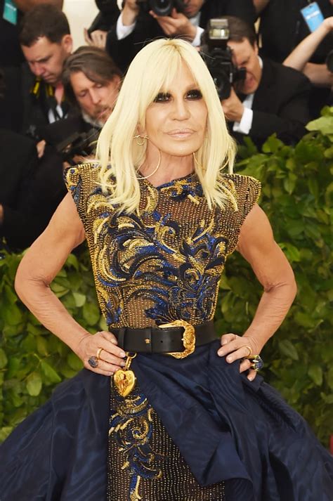 Vogue’s Stunning Donatella Versace Belt Dress: A Fashion 